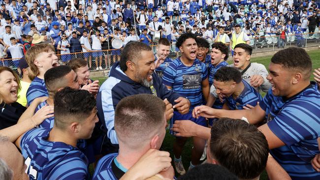 Patties players celebrate their success with Frank Pritchard. Pic: Jonathan Ng