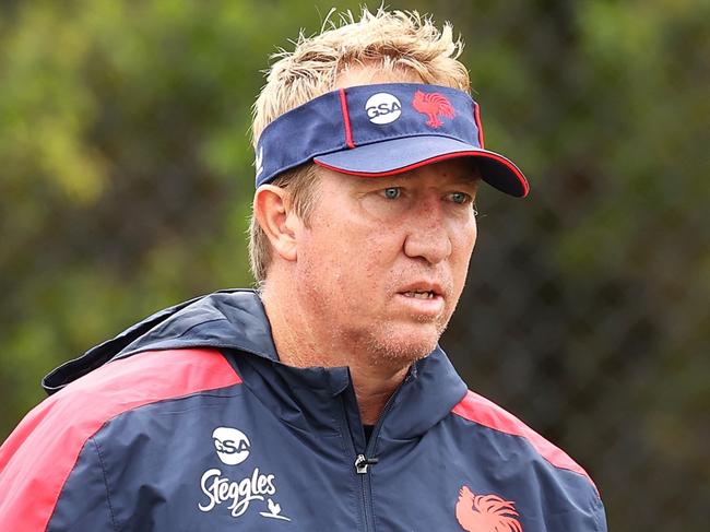 SYDNEY, AUSTRALIA - MARCH 07: Rooster head coach Trent Robinson speaks to Cooper Cronk during a Sydney Roosters NRL training session at Robertson Road Synthetic Field on March 07, 2022 in Sydney, Australia. (Photo by Mark Kolbe/Getty Images)