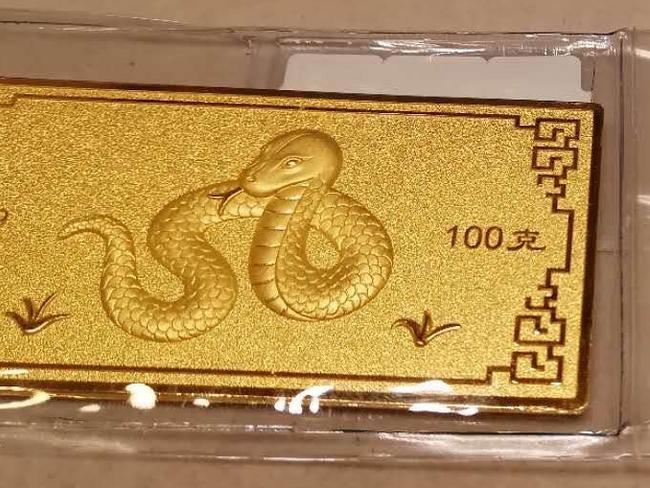 Gold bricks, including this one with a snake on it, were stolen from the home: SA Police