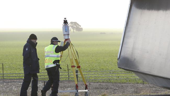 Police at the scene of the bus crash. Picture: David Caird