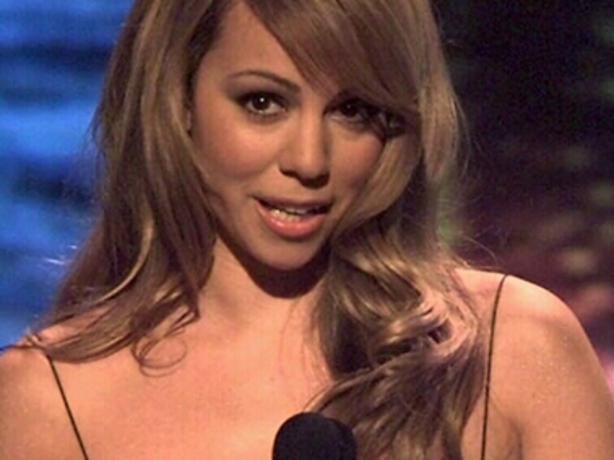 Singer Mariah Carey presents an /award during the MTV Video Music Awards at NY's Radio/City Music/Hall Sept. 04, 1997. (AP Photo/Adam/Nadel) Music singers headshot alone usa