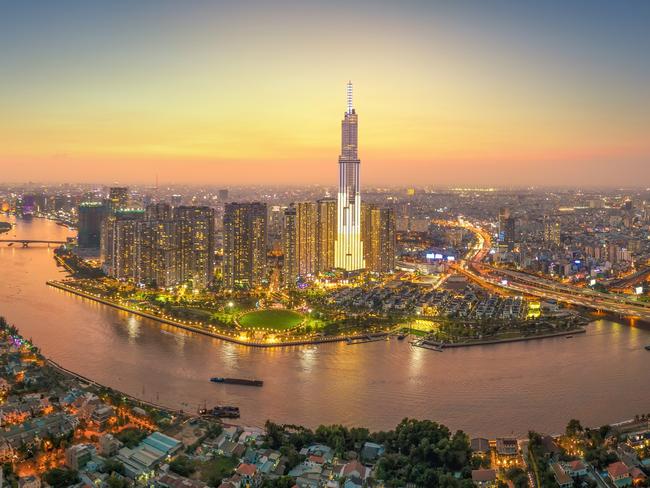 aerial view of Ho Chi Minh city, Vietnam, beauty skyscrapers along river light smooth down urban development, a developed metropolitan with office and business center. Travel and business concept.Escape 22 October 2023Cover Story - Stop oversPhoto - iStock