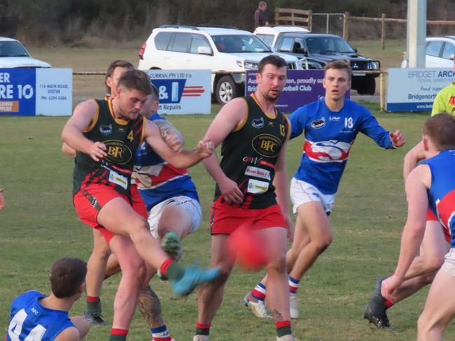 Bridgenorth's Campbell Atkins gets a kick away. Picture: Jon Tuxworth