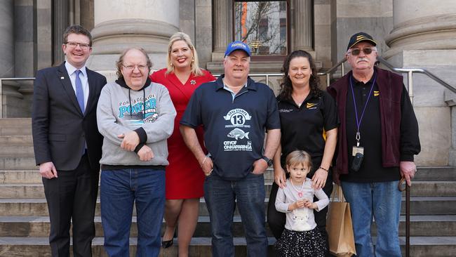 Chris Picton MP, Tom Gower, Katrine Hildyard MP, Mark Mills, Christine Rootsey with daughter Charlotte and Bernie Dunn outside Parliament House. Picture: Supplied.