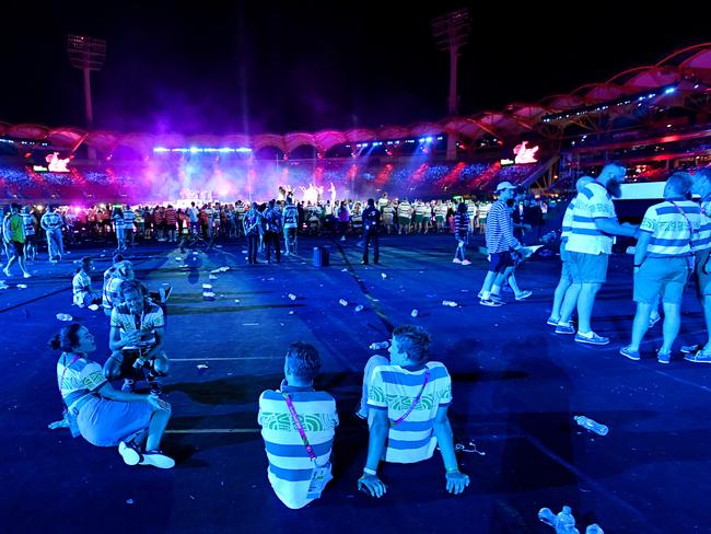 Aussie athletes sit at last night’s Closing Ceremony. Picture: Darren England