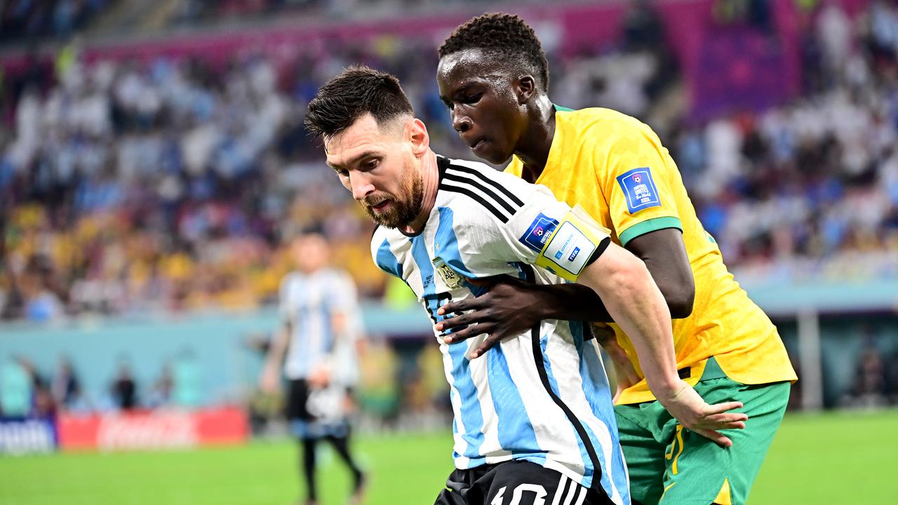 The GOAT and Lionel Messi compete for the ball during the World Cup. (Photo by MB Media/Getty Images)