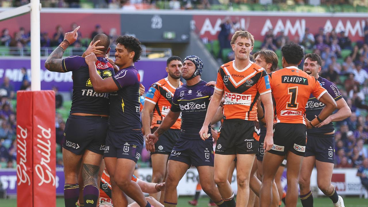 Nelson Asofa-Solomona of the Storm celebrates after scoring a try during the round 10 NRL match between Melbourne Storm and Wests Tigers at AAMI Park, on May 11, 2025, in Melbourne, Australia. (Photo by Mike Owen/Getty Images)