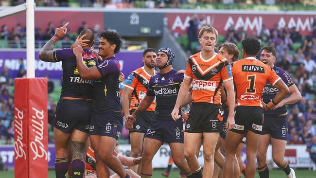 Nelson Asofa-Solomona of the Storm celebrates after scoring a try during the round 10 NRL match between Melbourne Storm and Wests Tigers at AAMI Park, on May 11, 2025, in Melbourne, Australia. (Photo by Mike Owen/Getty Images)