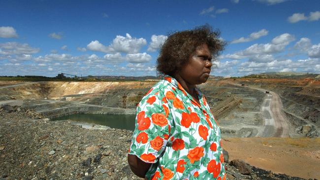 Senior traditional owner Yvonne Margarula of the Mirarr people stands infront of a Ranger uranium mine pit. Picture: Supplied