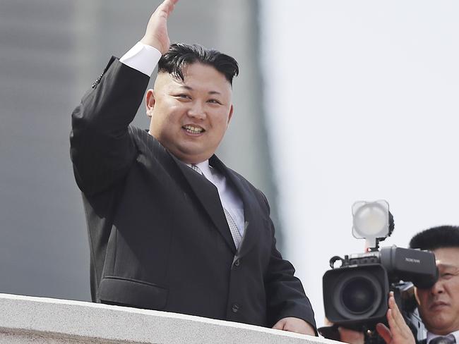 North Korean leader Kim Jong Un waves during a military parade in Pyongyang, North Korea. Picture: AP.