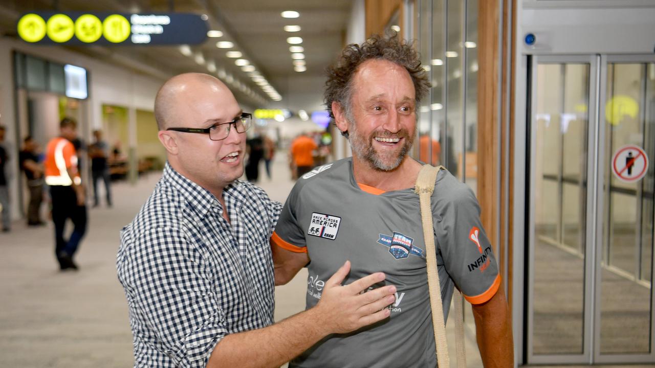 Allan Jefferson at the Townsville Airport after returning triumphant from the Race Across America. Selectability chief operating officer Aaron Farrell with Mr Jefferson. Picture: Evan Morgan