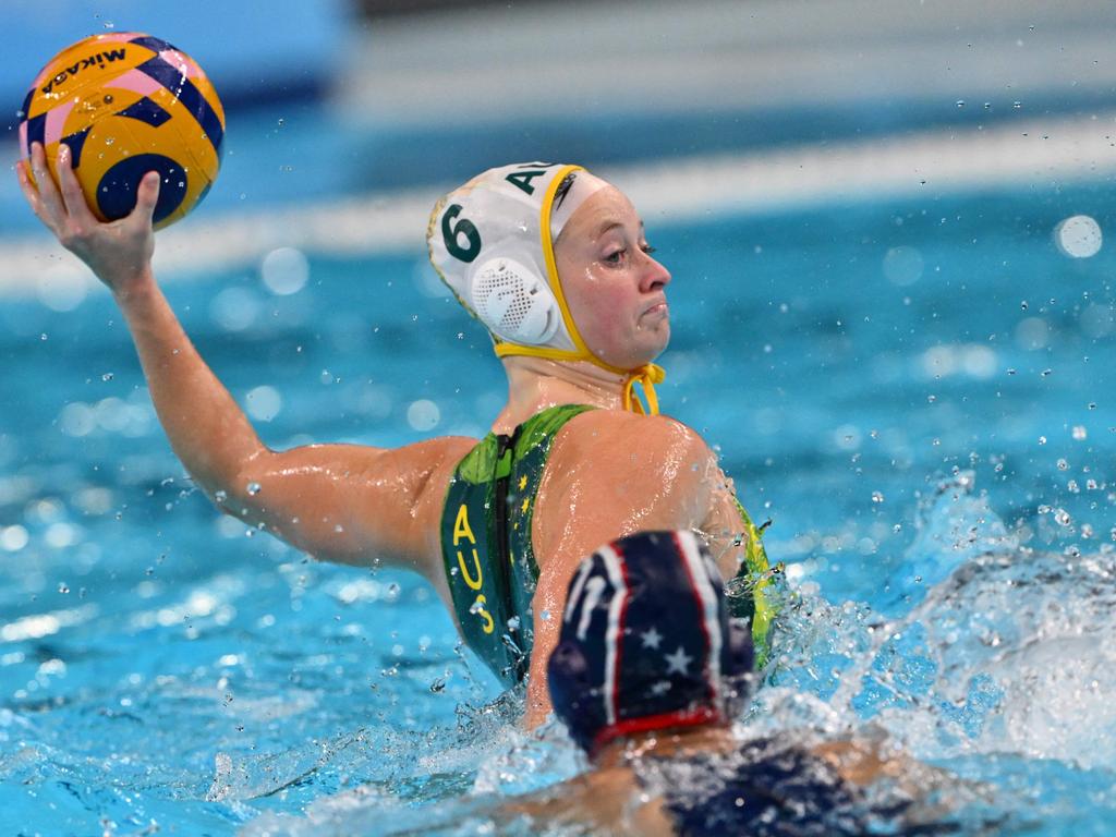 Australia's #06 Abby Andrews shoots the ball in the women's water polo semi-final match between Australia and USA on August 8. Picture: Andreas Solaro/AFP