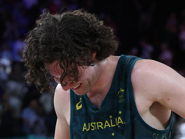 NCA. PARIS FRANCE 2024 OLYMPIC GAMES. August 6- Day 11Josh Giddey limps off after the Mens Basketball Quarterfinal between Australia and Serbia at Bercy Arena.: Adam Head