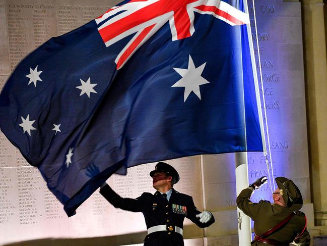 Australian servicemen take part in Anzac Day ceremonies at the military cemetery of the Australian National Memorial in Villers-Bretonneux, northern France, on April 25, 2019 marking 101 years since Australian and NZ Army Corps soldiers landed in Gallipoli during WWI, and were deployed to the Western Front, where they played an important role in the 1916 Battle of the Somme. - The memorial in Villers-Bretonneux lists 10,773 names of soldiers of the Australian Imperial Force with no known grave who were killed between 1916, when Australian forces arrived in France and Belgium, and the end of the war. (Photo by PHILIPPE HUGUEN / AFP)