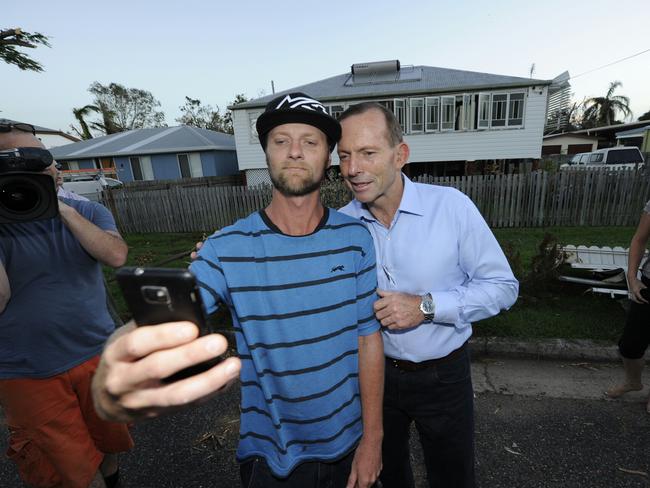 Tony Abbott was visiting Queenslanders affected by Cyclone Marcia, and taking selfies. Picture: David Foote