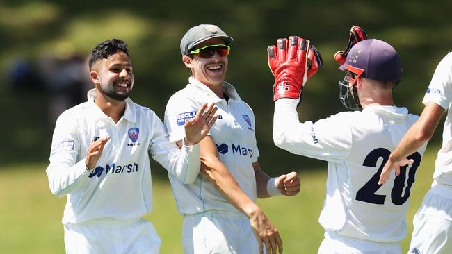 Tanveer Sangha celebrating his dismal of Sam Harper in the Shield match against Victoria at Drummoyne Oval last week.