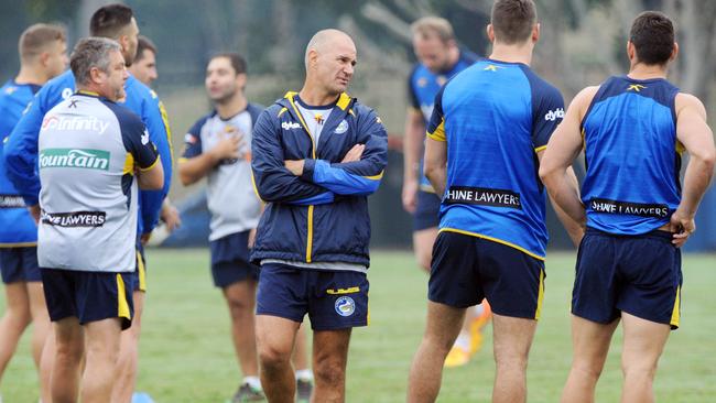 Coach Brad Arthur chats to players during Eels training.