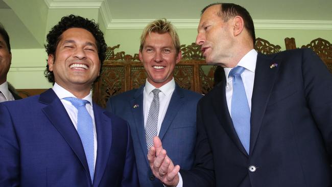 Indian cricket great Sachin Tendulkar, Australian pace bowler Brett Lee and then prime minister Tony Abbott at the Cricket Club of India in Mumbai In 2014.