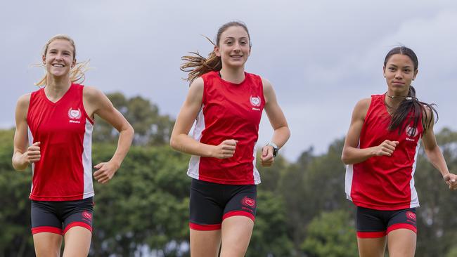 Palm Beach Currumbin High students, Sienna Bush, Charlotte Hart, and Thewbelle Philp, have Olympic dreams in their sights. Picture: Jerad Williams