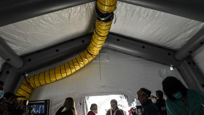 An oxygen system running through a large yellow hose in the tent hospital. Picture: Stephanie Keith/Getty Images/AFP