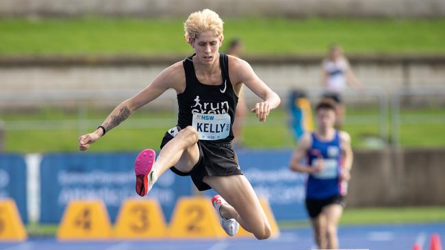 Daniel Kelly from Wentworth Falls in the steeplechase final on Sunday and after his win in the 1500m a day earlier.