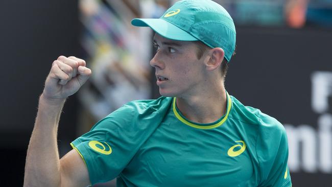 Alex De Minaur celebrates after defeating Fernando Verdasco at the Sydney International.