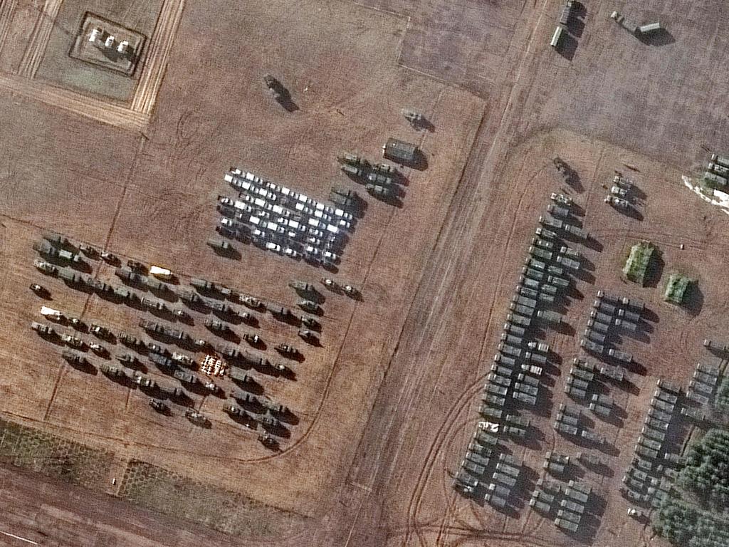 This Maxar satellite image taken and released on February 22, 2022 shows a close-up of assembled vehicles, part of a new deployment consisting of more than 100 vehicles and dozens of troop tents.