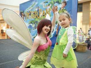 Ella Ollier meets Tinkerbell ( Jam Marshall ) at the Peter Pan stage show at Grand Central shopping centre. Tuesday, July 2, 2014. Photo Nev Madsen / The Chronicle. Picture: Nev Madsen