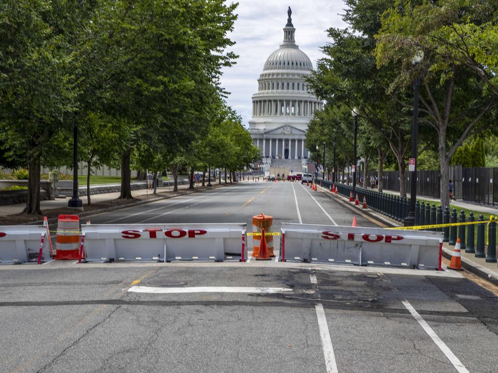 Man Crashes Car Into Us Capitol Barricade And Fires Shots Au