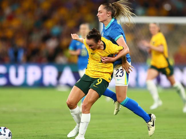 Caitlin Foord battling for possession with Isa Haas. Picture: Chris Hyde/Getty Images