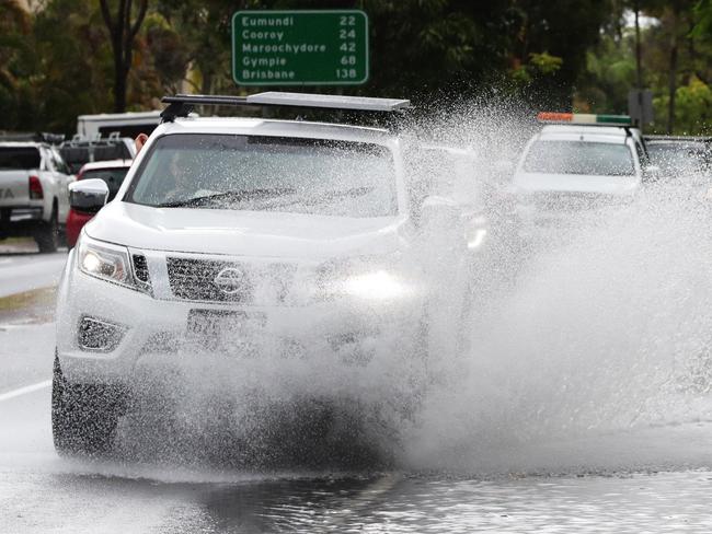 Water over the road at Noosa today. Picture Lachie Millard