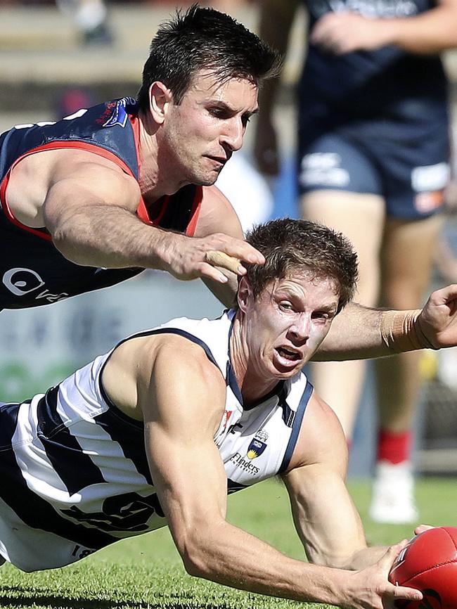 Norwood’s Matthew Panos pounces on South’s Matthew Rose. Picture Sarah Reed