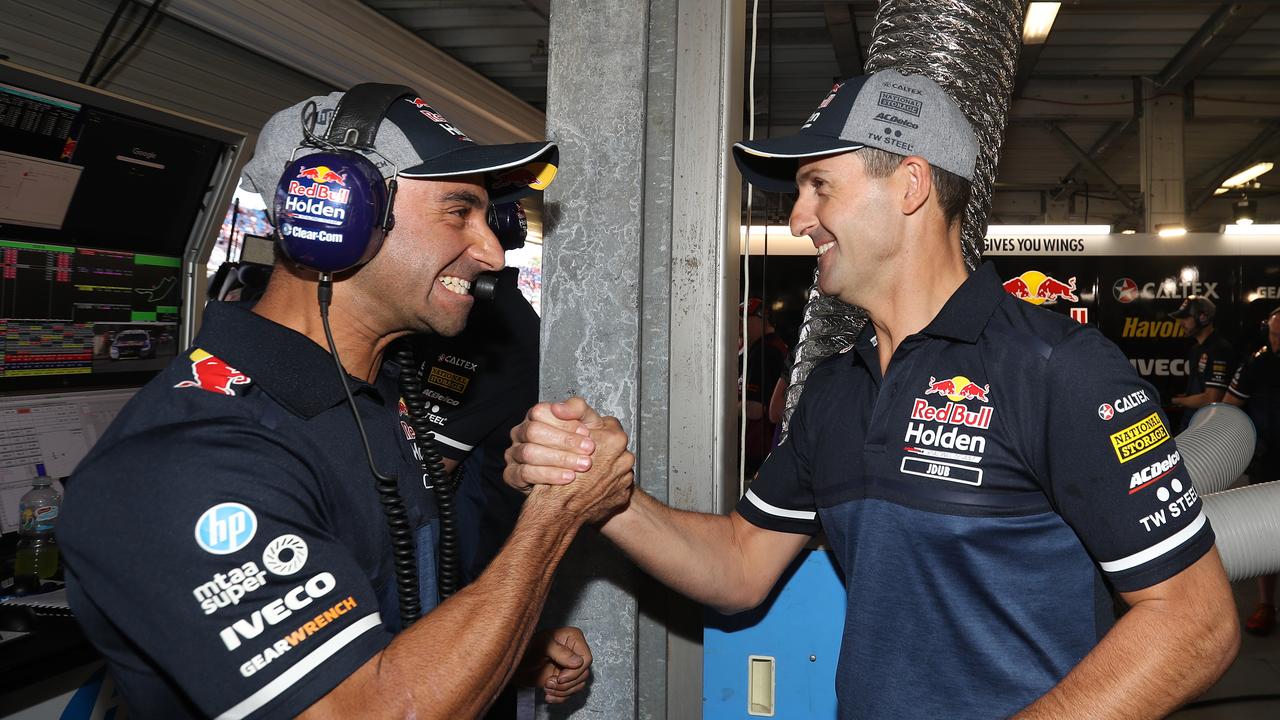 Jamie Whincup celebrates his Race 1 pole with engineer David Cauchi.