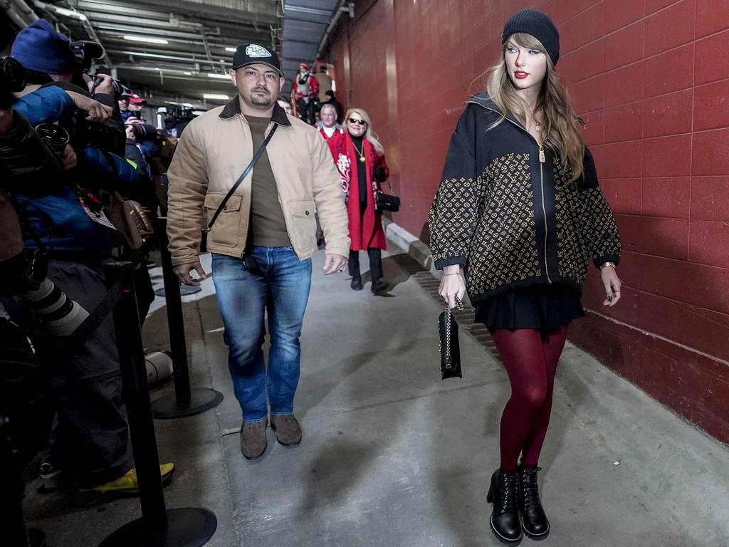 Taylor Swift makes one of her signature grand entrances at Arrowhead Stadium. Picture: AP