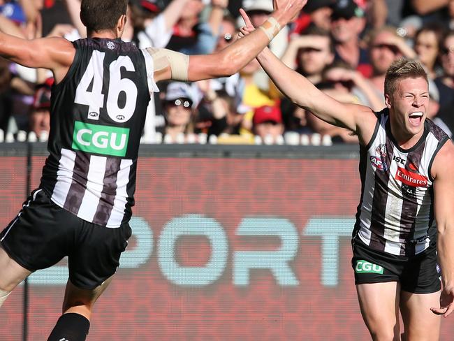 Jordan De Goey celebrates his stunning first-term goal against Essendon. Pic: Michael Klein