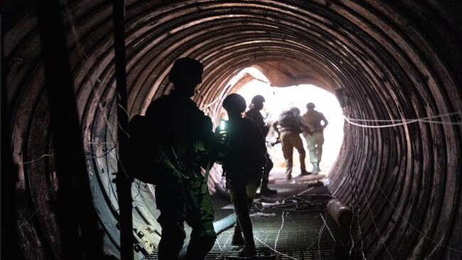 Soldiers stand in a large Hamas tunnel found near the Erez border crossing in the northern Gaza Strip. Picture: IDF