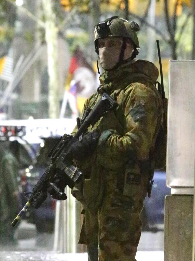 Australian counter terrorism troops deploy in Sydney’s CBD as part of a training exercise in 2013. Picture: Bill Hearne