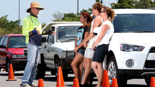 Defensive driving trainer Peter Roggenkamp with students Jessica Buttigieg, James Watson and Julianne Reed in 2012.