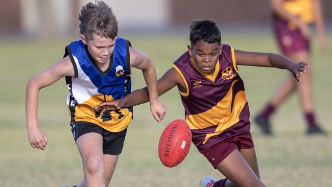 day three of the School Sport SA Sapsasa Country Football Carnival - Year 7 Division 2: Kangaroo Island (Blue) v Western Eyre Peninsula (maroon) at West Beach , 2 June 2021. Picture Simon Cross