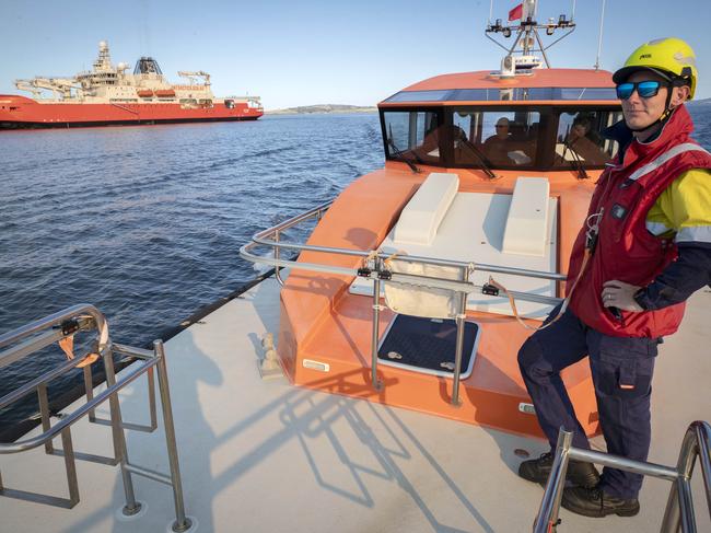 Marine operative Luke Watkins on-board the pilot boat Kelly as Nuyina research vessel arrives at Hobart. Picture: Chris Kidd