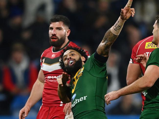 HUDDERSFIELD, ENGLAND - NOVEMBER 04: Josh Addo-Carr of Australia celebrates after scoring their team's second try during the Rugby League World Cup Quarter Final match between Australia and Lebanon at John Smith's Stadium on November 04, 2022 in Huddersfield, England. (Photo by Gareth Copley/Getty Images)