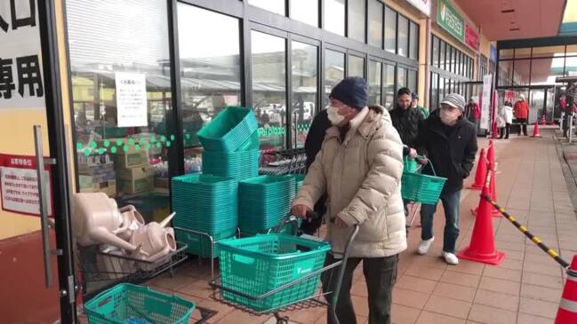 Japanese 'grateful' as supermarket reopens after quake