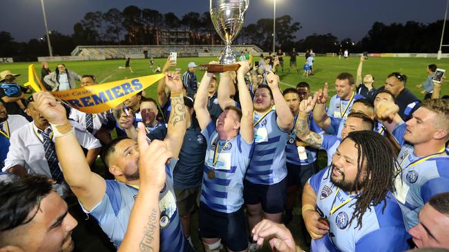 Gold Coast District Rugby Union grand final between Griffith University Colleges and Helensvale Hogs. Photo of victory celebrations. Photo by Richard Gosling