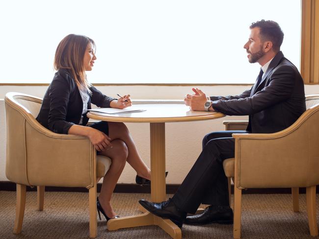 CAREERS: Ensuring you are prepared before a negotiation can make all the difference to the outcome. Picture: iStockFull length view of a young female recruiter meeting a male candidate for a business position and talking about his resume