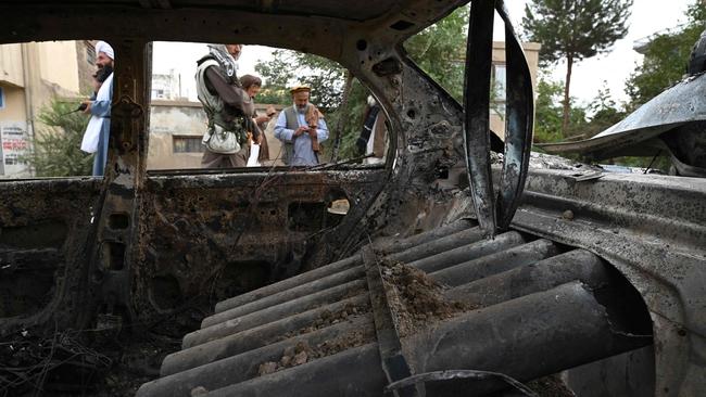 A rocket launcher in the back seat of the car taken out by a US drone in the streets on Kabul on Sunday. Picture: AFP