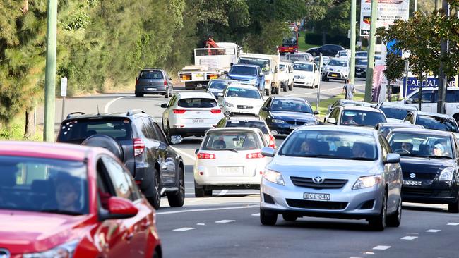 The daily peak hour traffic jam on the Pacific Highway through Wyong has been complained about for decade. Picture: Peter Clark