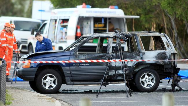 James Russouw’s burnt out car at the scene of his murder.