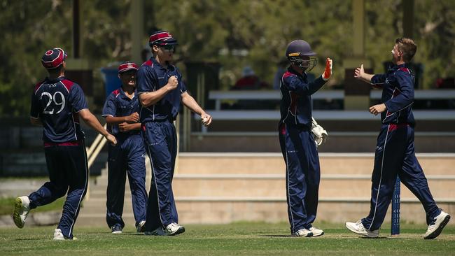 TSS First 11 celebrate the 2nd BHS wicket of Callem McCathie, caught behind as The Southport School v Brisbane State High School at The Southport School/Village Green. Picture: Glenn Campbell