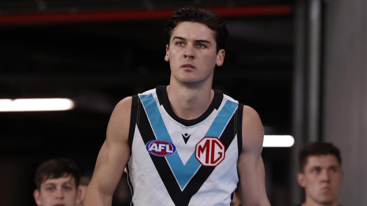 MELBOURNE, AUSTRALIA - JULY 26: Connor Rozee of the Power walks out onto the ground before the round 20AFL match between Carlton Blues and Port Adelaide Power at Marvel Stadium, on July 26, 2024, in Melbourne, Australia. (Photo by Darrian Traynor/Getty Images)