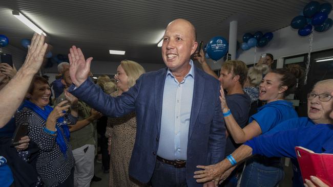 Federal Member for Dickson Peter Dutton arrives with his wife Kirilly to celebrate the win of the Dickson Electorate against Ali France in the Federal Election in Strathpine on Election Night in Brisbane, Saturday, 18 May, 2019. (AAP Image/Glenn Hunt)